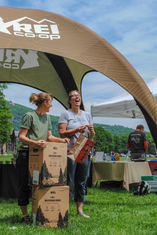 Our partners from REI raffle off gear prizes at the National Trails Day celebration at Bear Mountain State Park. Photo by Heather Darley.