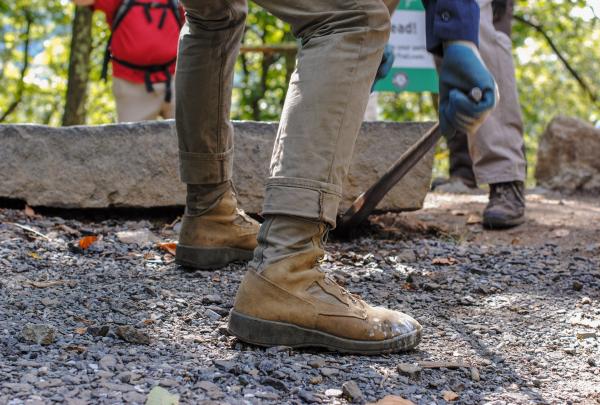 Setting the last step on the Bear Mountain Trails Project. Photo by Heather Darley.